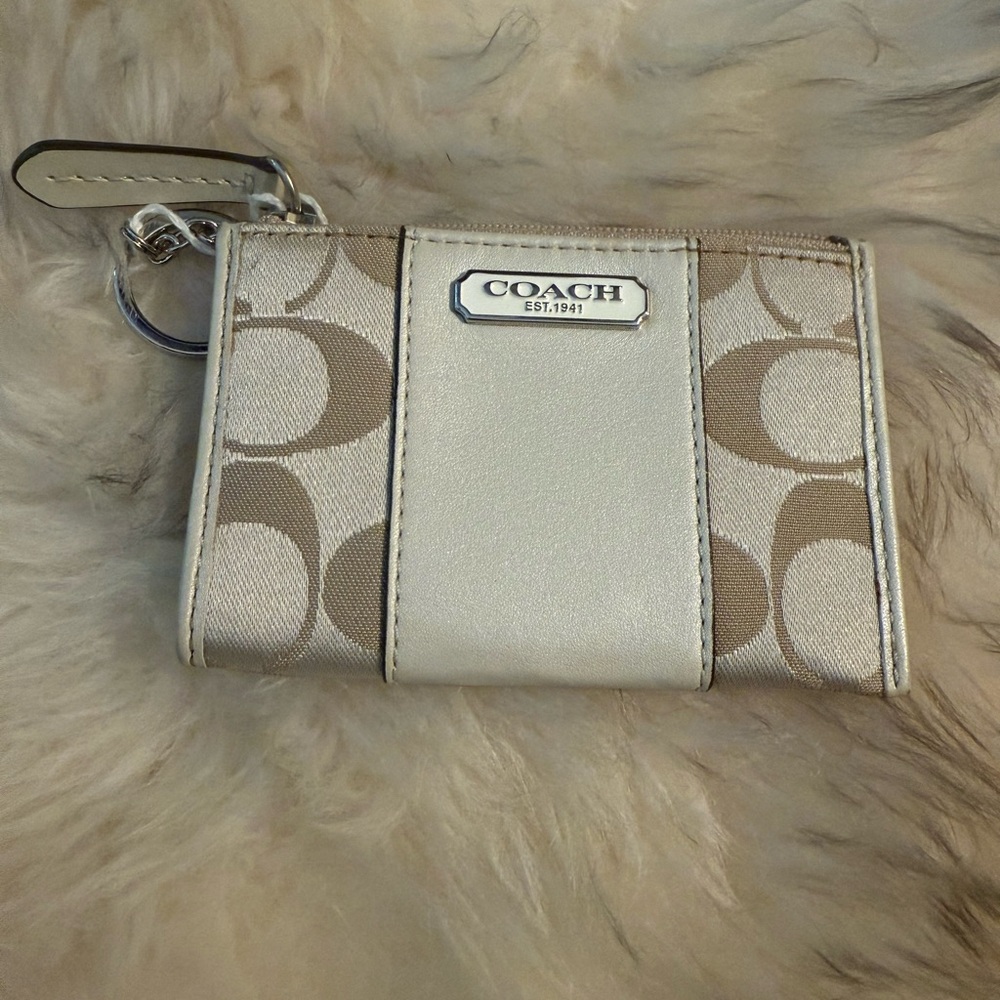 Coach Beige and White Key pouch to keep cards, lipstick or change with keys.